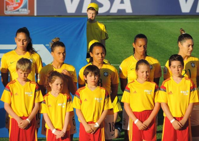 Halifax County United Soccer Club’s U-10 teams were among the several local youth soccer clubs from Nova Scotia asked to help on the field at the FIFA Women’s World Cup games in Moncton. They’re seen here escorting the Brazilian team out onto the field.